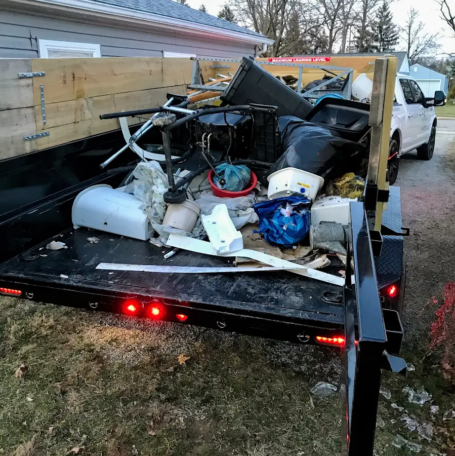 Roll-off dumpster delivered to a residential driveway in Lochearn
