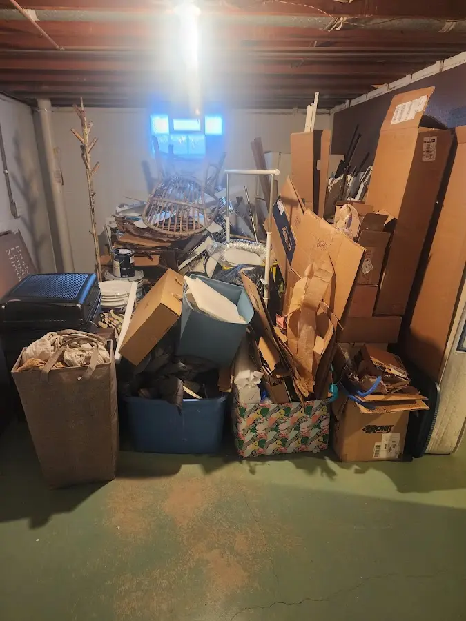 Roll-off dumpster container at job site for 15 Yard Dumpster Rental in Lochearn